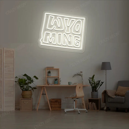 WYOMING Map Neon Sign lighting up in warmwhite color in a room