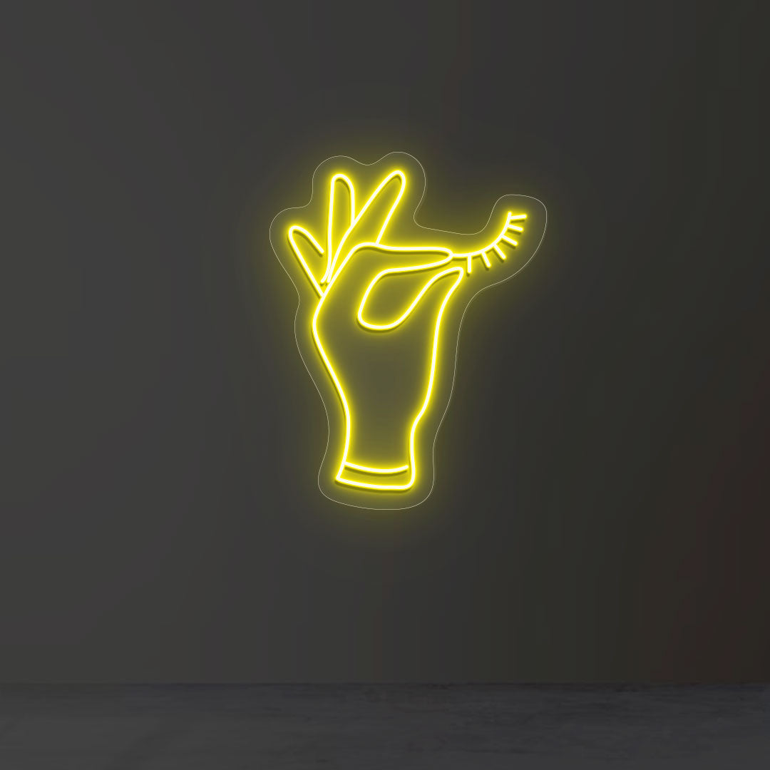 Hand Holding Eyelash Neon Sign | CNUS013090 | Yellow