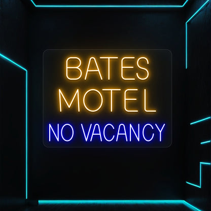 orange and blue bates motel no vacancy vintage neon sign mounted on a wall