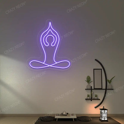 Padmasana With Raised Arms Yoga Neon Sign lighting up in purple color in a yoga room