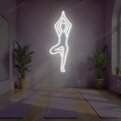 Vrikshasana Yoga Neon Sign lighting up in white color in a yoga room