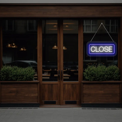 horizontal close neon sign glowing in blue color on a window