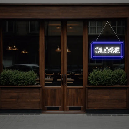 blue close neon sign hanging on a  window