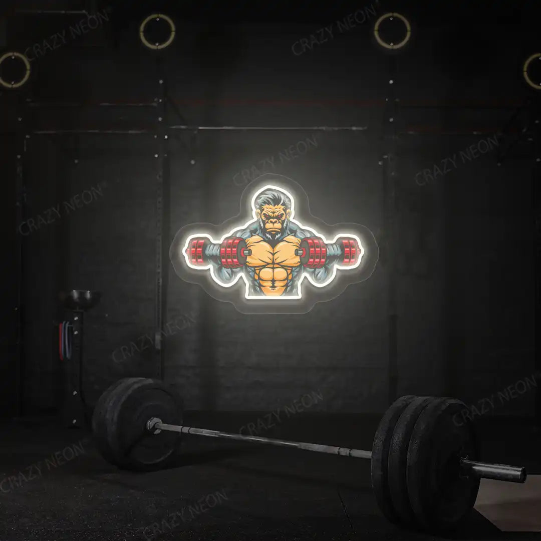 warm white monkey workout gym neon artwork mounted on a wall