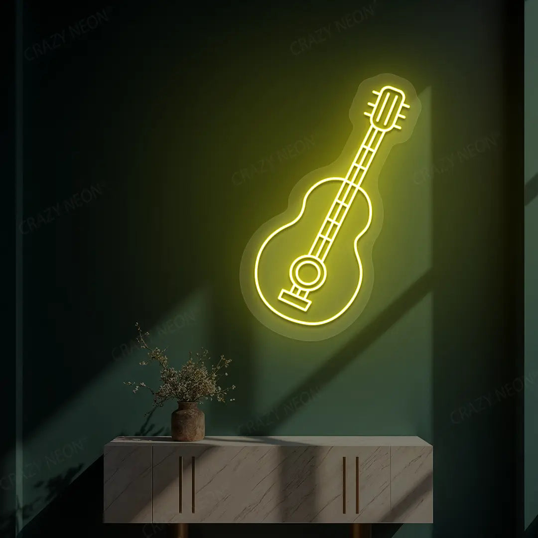yellow acoustic guitar neon sign mounted on a wall