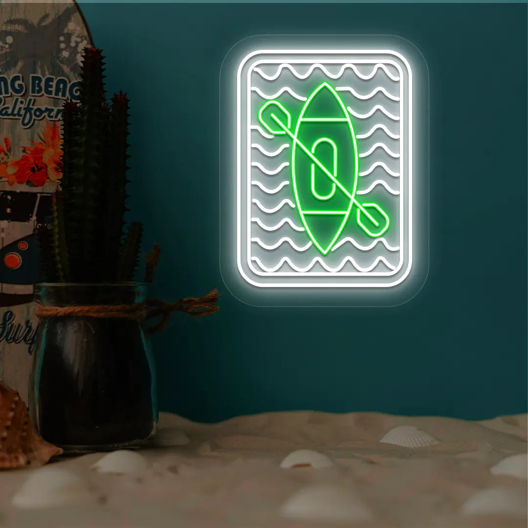 green and white kayak ocean waves neon sign mounted on a wall