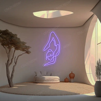 Purna Vrishchikasana Yoga Neon Sign glowing in purple color in a yoga room