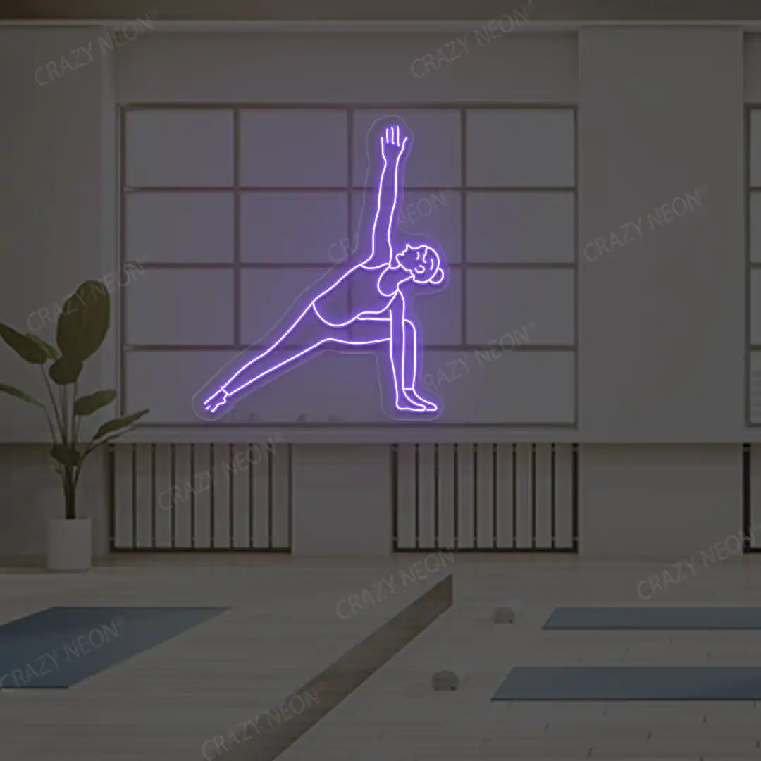 Utthita Parsvakonasana Yoga Neon Sign lighting up in purple color in a yoga room