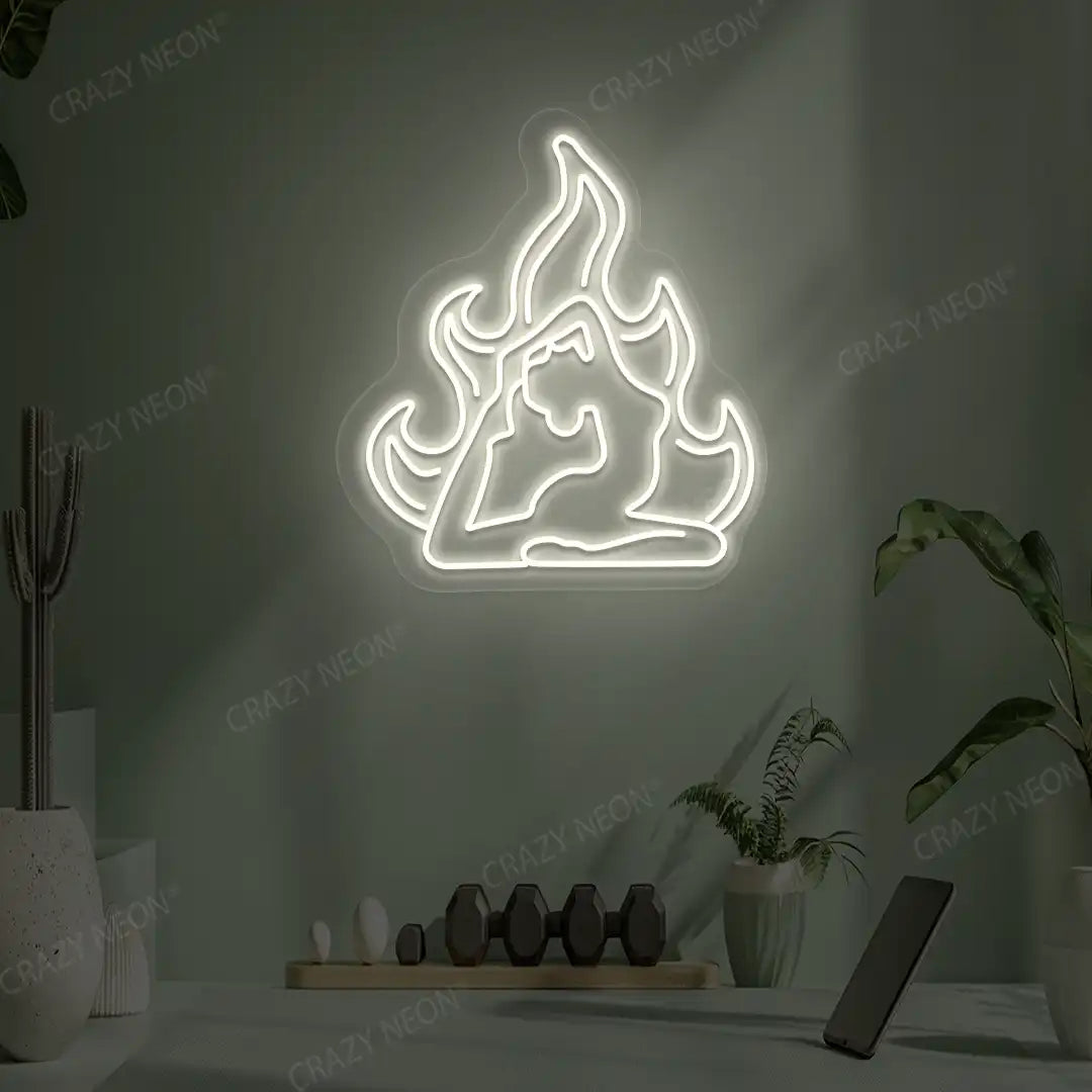 Flamed Eka Pada Rajakapotasana Yoga Neon Sign lighting up in warm white color in a yoga room
