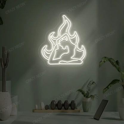Flamed Eka Pada Rajakapotasana Yoga Neon Sign lighting up in warm white color in a yoga room