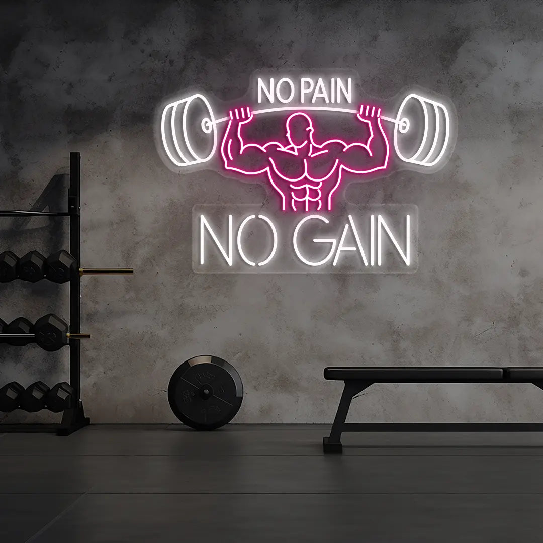 pink and white no pain no gain bodybuilder neon sign mounted on a wall