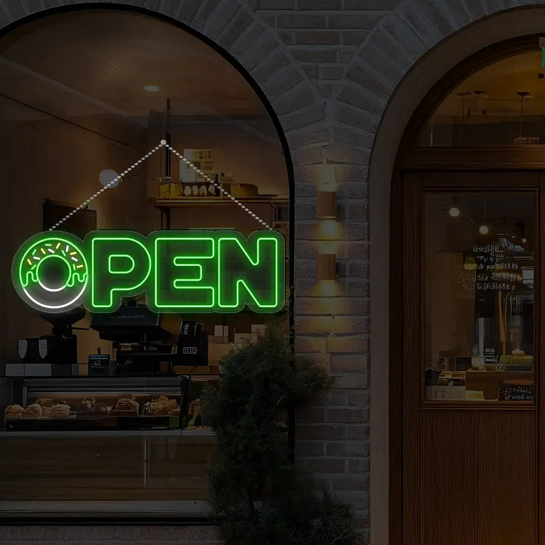 green donut open neon sign hanging on a window