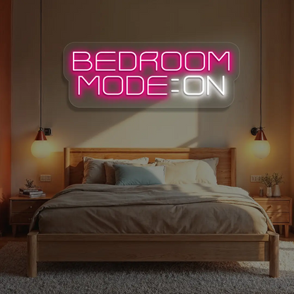 pink and white bedroom mode on neon sign mounted on a wall
