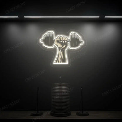 warm white hand lifting dumbbell gym neon artwork mounted on a wall