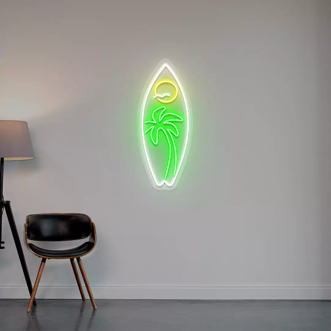 green yellow and white tropical surfboard neon sign mounted on a wall