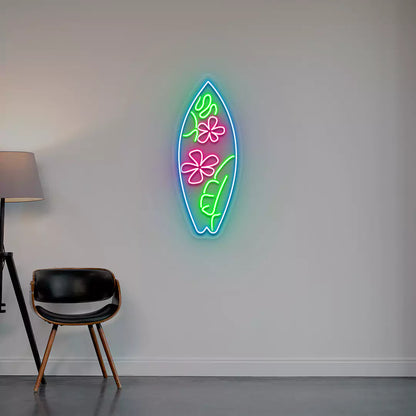pink green and ice blue flower surfboard neon sign mounted on a wall