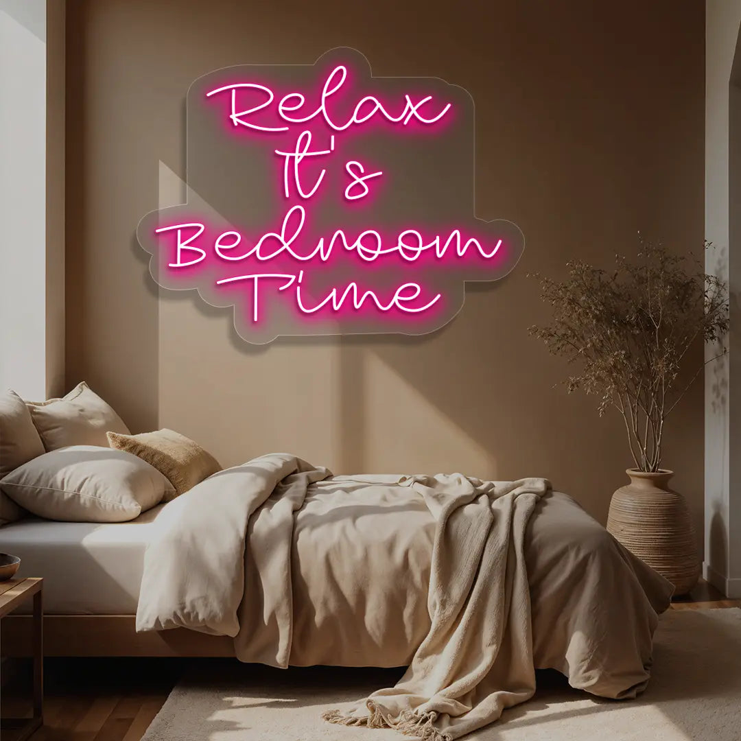 pink relax its bedroom time neon sign mounted on a wall