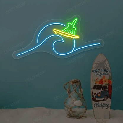 green yellow and ice blue surfer riding wave neon sign mounted on a wall