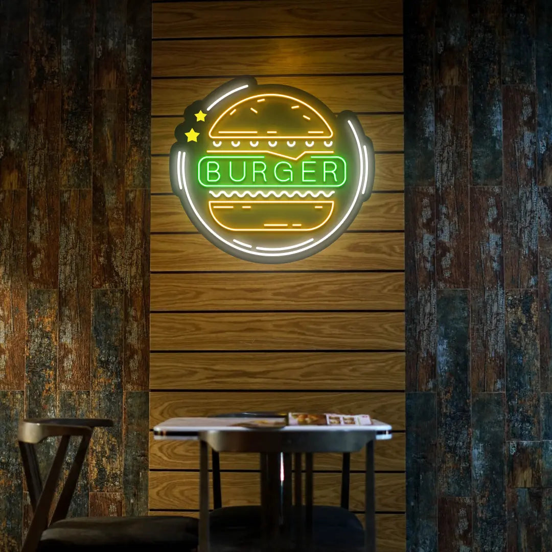 green orange and white burger buzz neon sign mounted on a wall