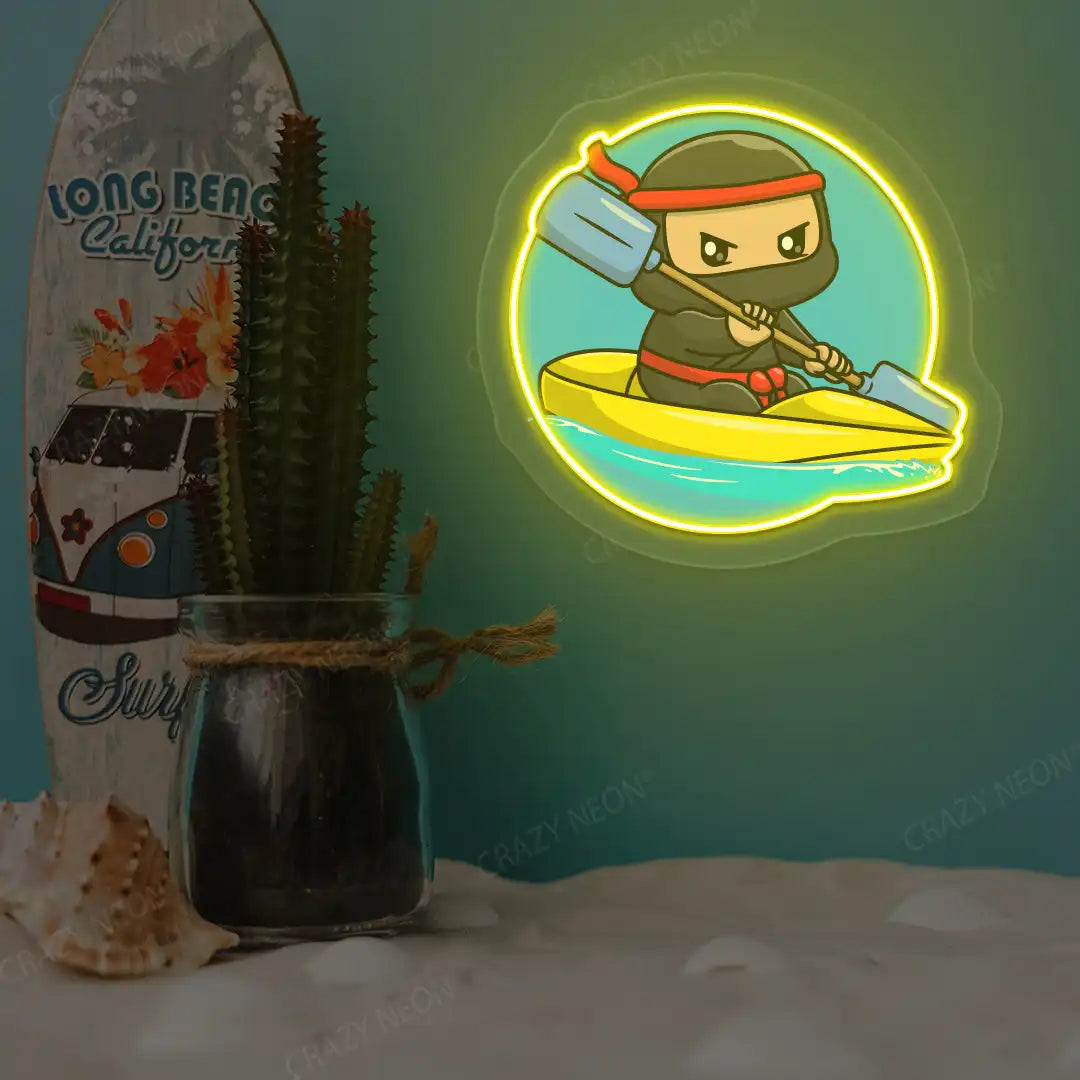 yellow ninja kayaking neon artwork mounted on a wall