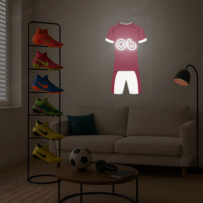 Claret football jersey neon artwork with number 06 glowing on a beige wall