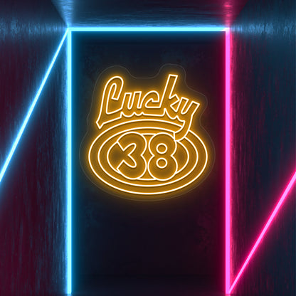 orange the lucky 38 vintage neon sign mounted on a wall