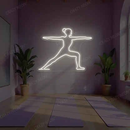 Virabhadrasana II Yoga Neon Sign lighting up in warm white color in a yoga room