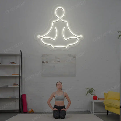 Sukhasana Yoga Neon Sign lighting up in warmwhite color in a yoga room