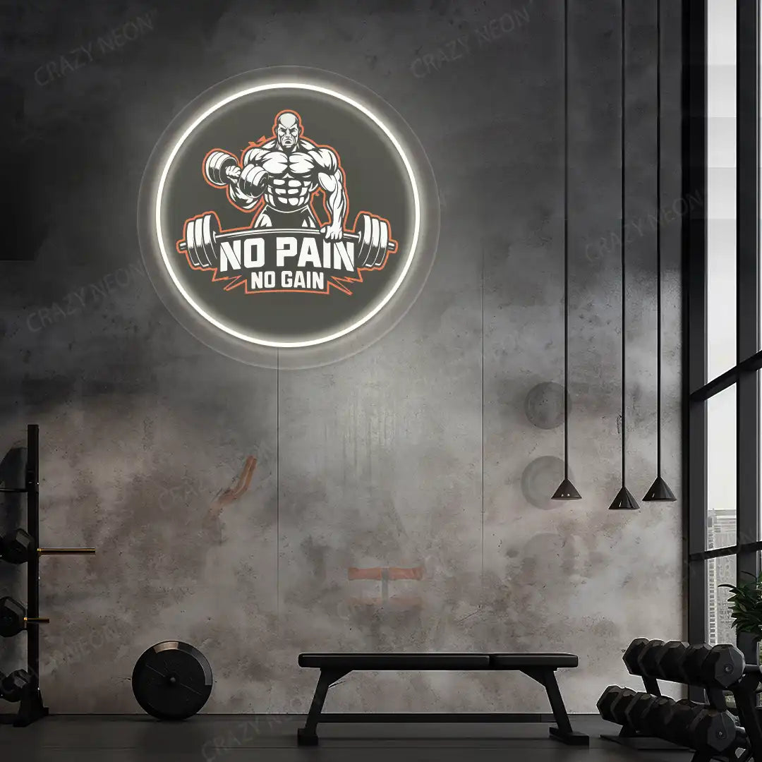 warm white no pain no gain gym neon artwork mounted on a wall