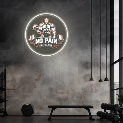 warm white no pain no gain gym neon artwork mounted on a wall