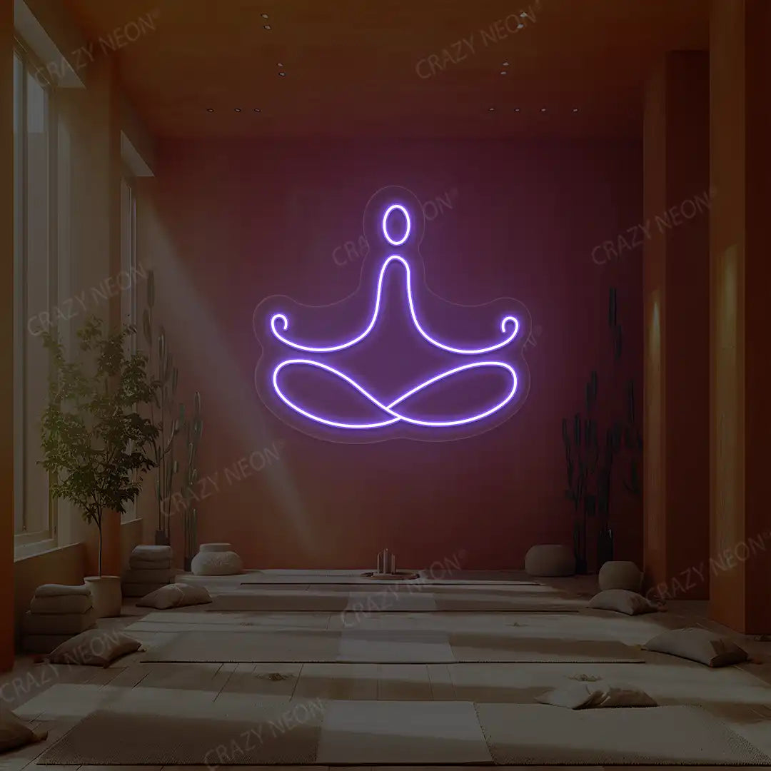 Padmasana Yoga Neon Sign lighting up in purple color in a yoga room