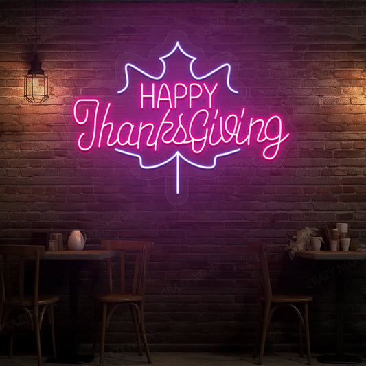 Happy thanksgiving on maple leaf neon sign in pink and purple