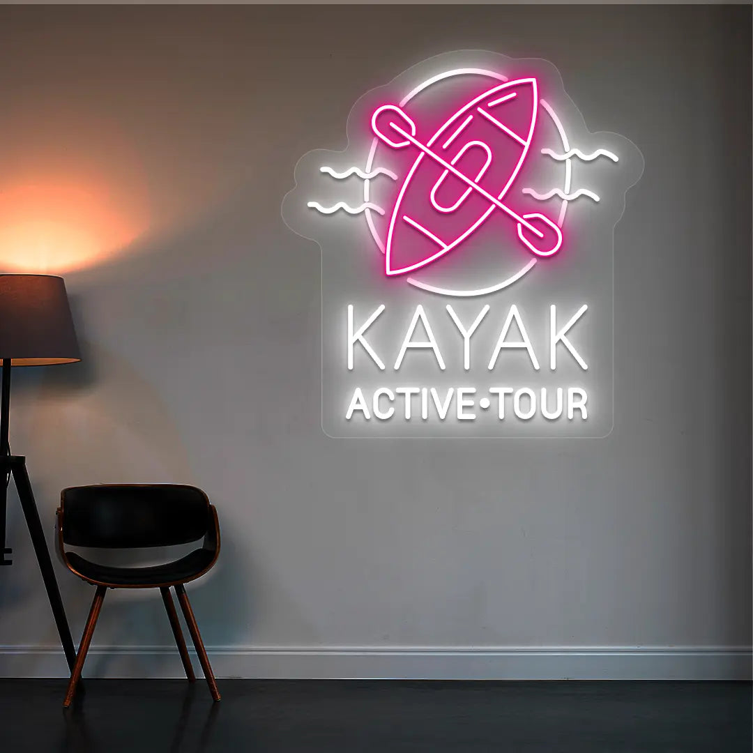 pink and white kayak active tour neon sign mounted on a wall