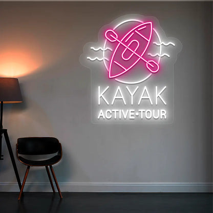 pink and white kayak active tour neon sign mounted on a wall