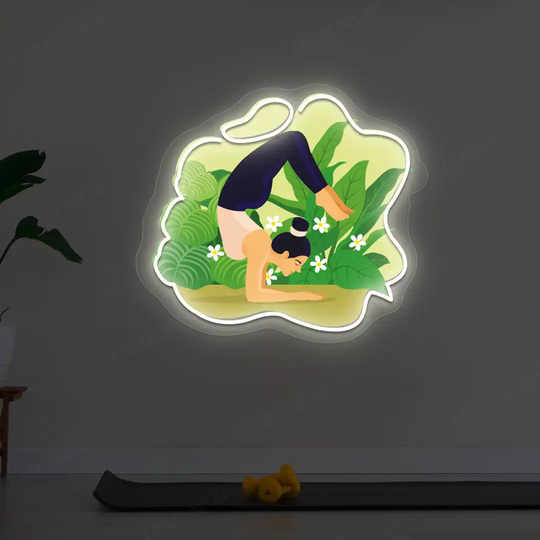 Vrischikasana Garden Yoga Neon Artwork lighting up in warm white color  in a yoga room