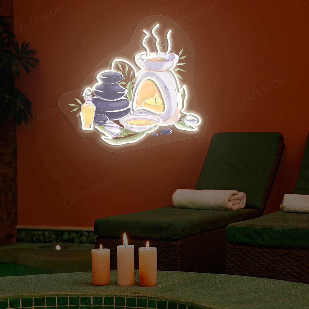 Spa Stones & Aromatherapy Neon Artwork lighting up in warm white color on a spa wall