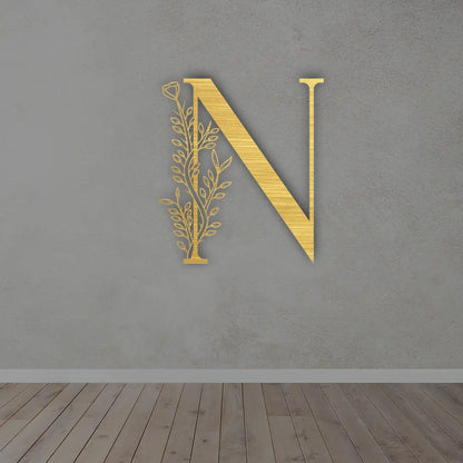 Metal Initial Sign in Golden colour mounted on wall 