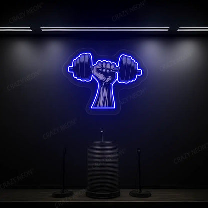 blue hand lifting dumbbell gym neon artwork mounted on a wall