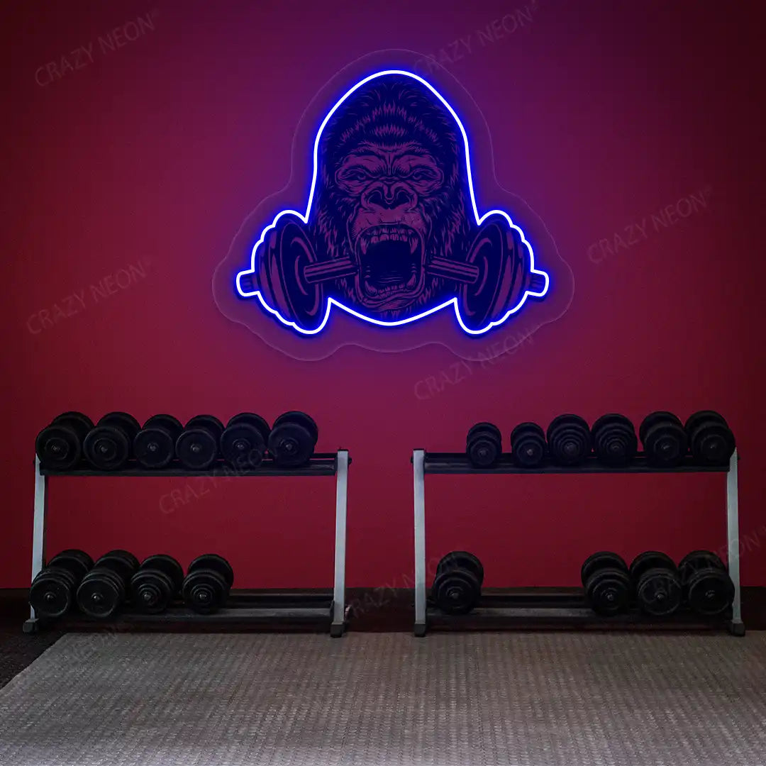 blue gorilla barbell gym neon artwork mounted on a wall