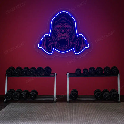 blue gorilla barbell gym neon artwork mounted on a wall