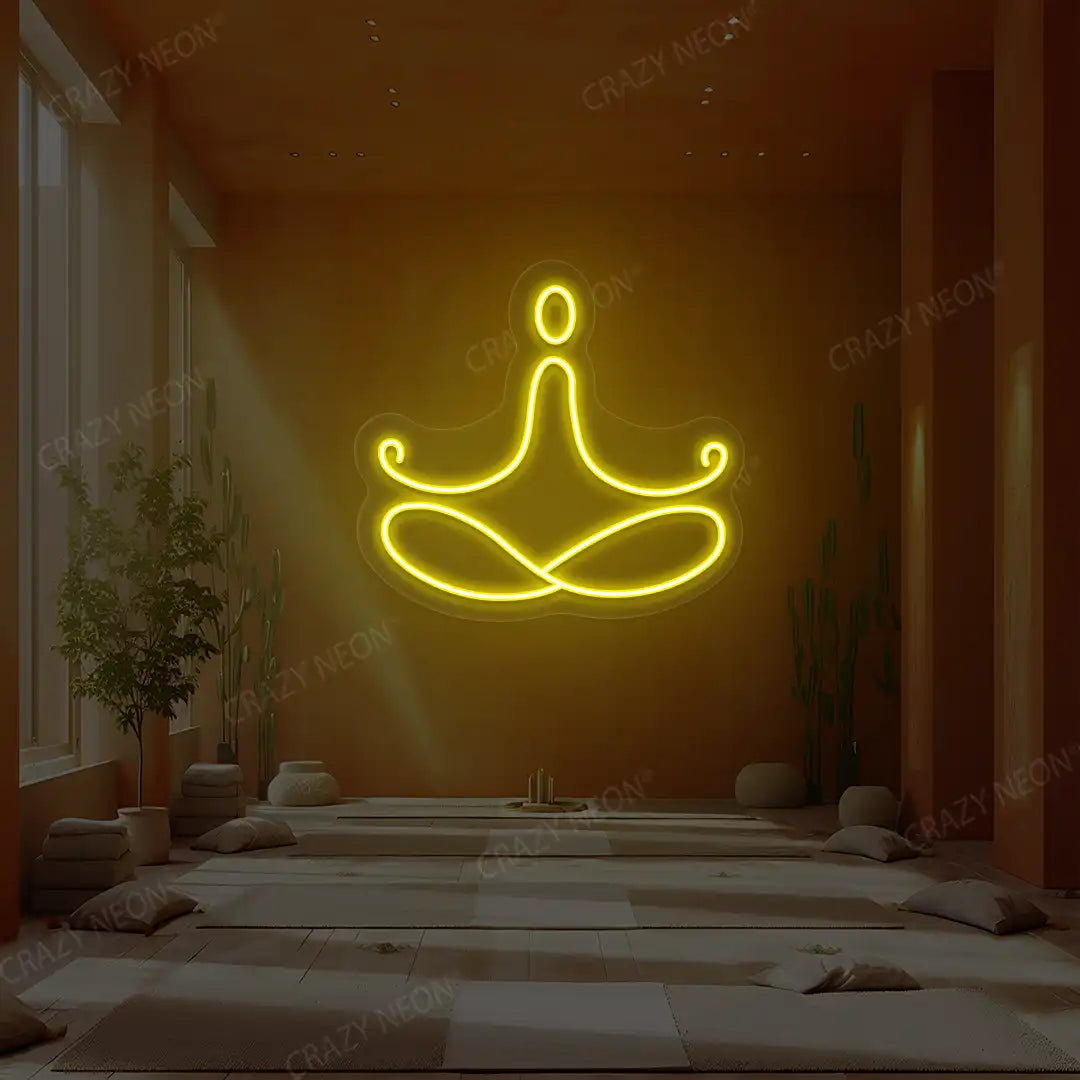 Padmasana Yoga Neon Sign lighting up in yellow color in a yoga room