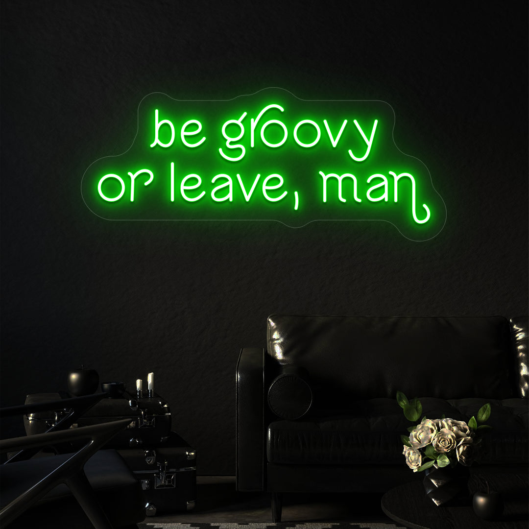 green be groovy or leave, man vintage neon sign mounted on a wall