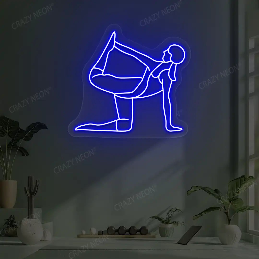 Ardha Dhanurasana Yoga Neon Sign glowing in blue color in a yoga room