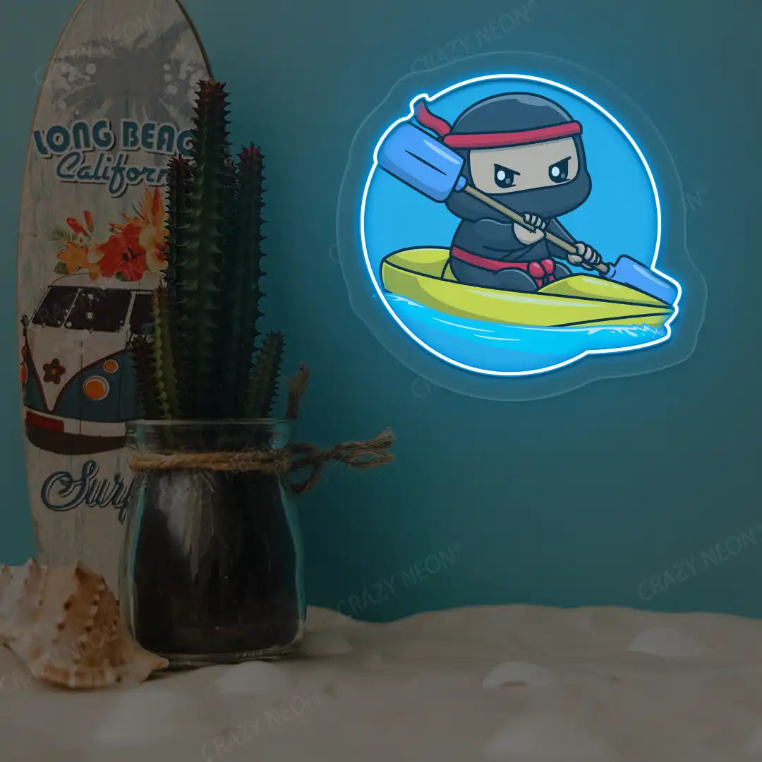 ice blue ninja kayaking neon artwork mounted on a wall