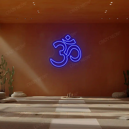 Om Symbol Neon Sign lighting up in blue color in a yoga room