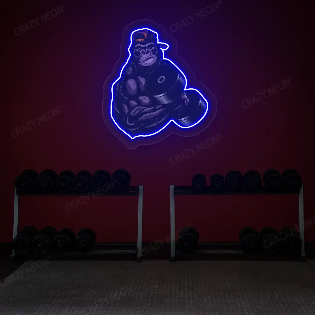 blue gorilla dumbbell lifting gym neon artwork mounted on a wall
