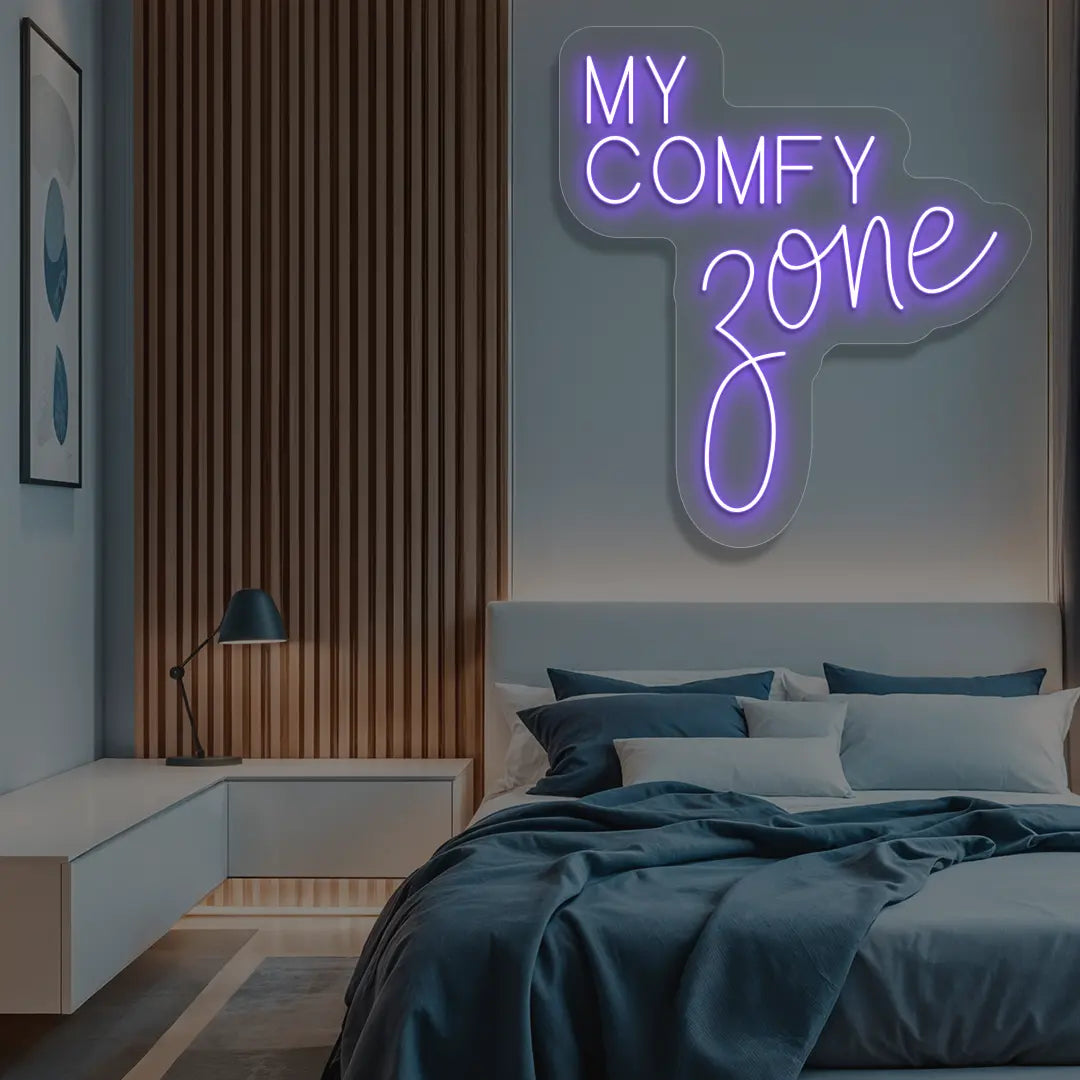 purple my comfy zone neon sign mounted on a wall