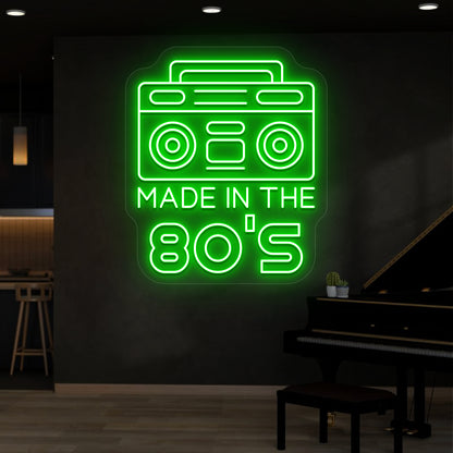 green made in the 80s stereo vintage neon sign mounted on a wall