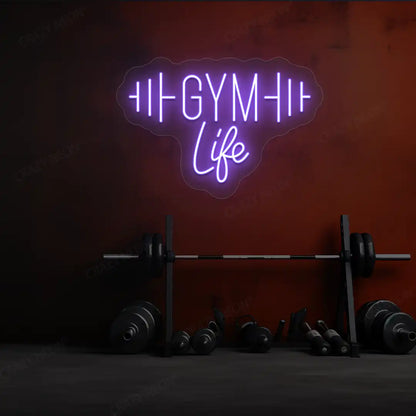 purple gym life neon sign mounted on a wall