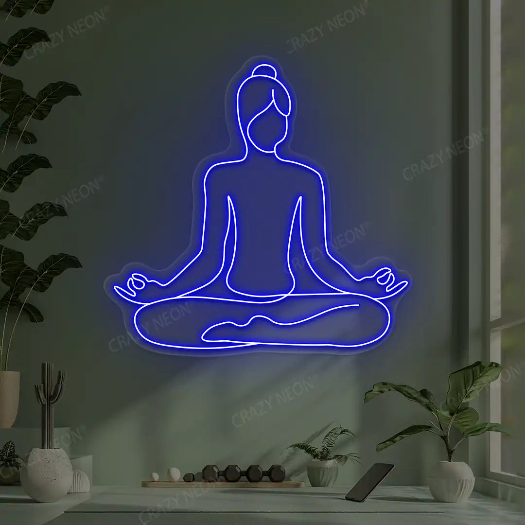 Swastikasana Contour Yoga Neon Sign lighting up in blue color in a yoga room